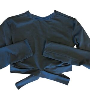 Black long sleeve dance top with cut outs.